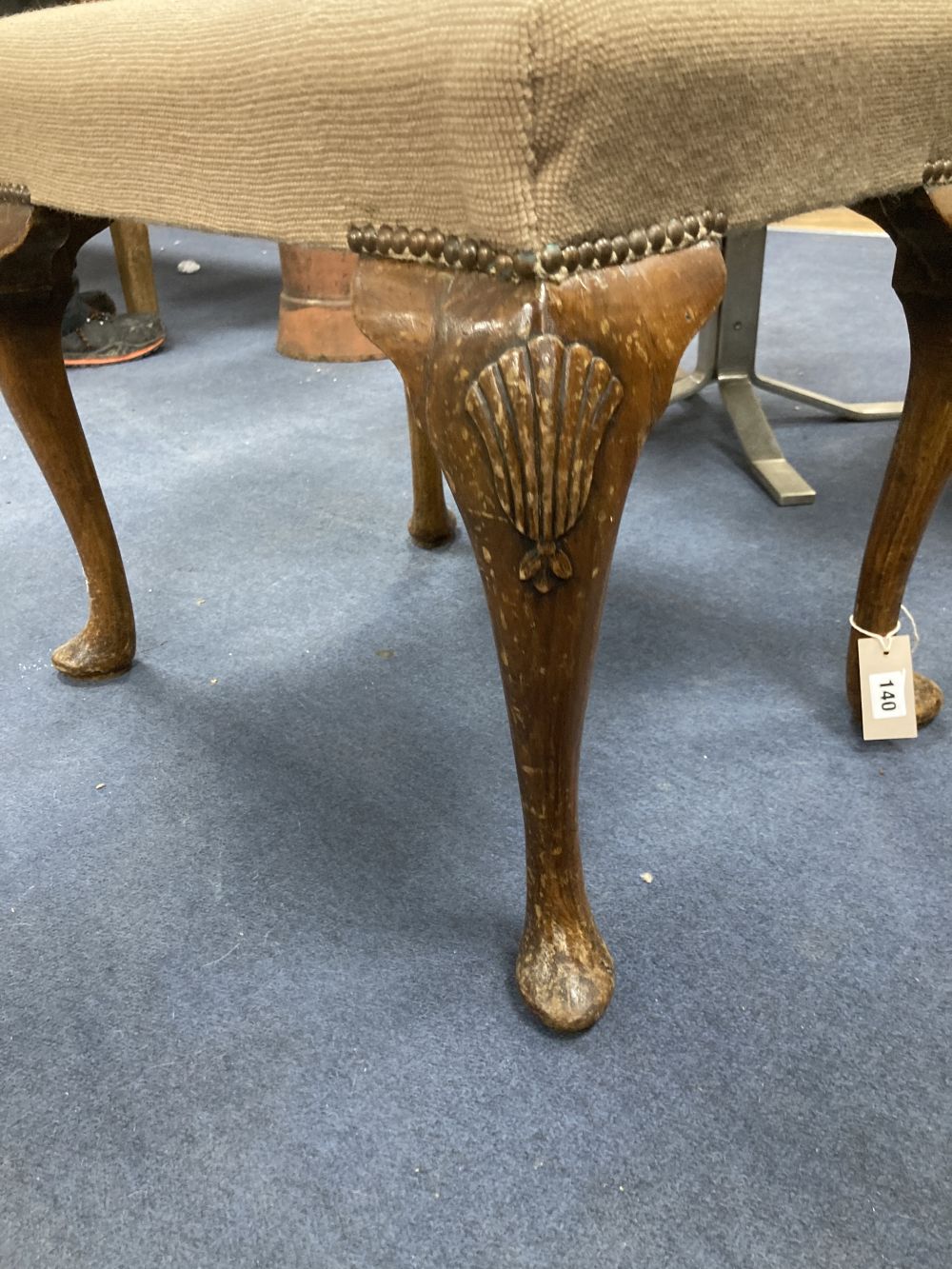 A Queen Anne revival walnut dressing stool, width 57cm depth 43cm height 46cm